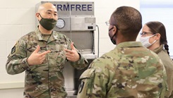 Military personnel in medical lab