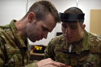 Military personnel printing 3D face masks
