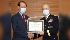 U.S. Army Lt. Gen. (Dr.) Ronald J. Place  and Dr. Louis French at award ceremony