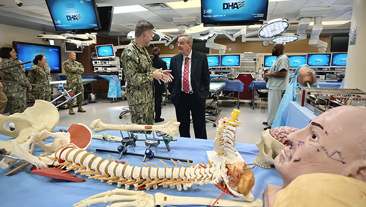 SAN DIEGO (Sept. 14, 2023) Dr. Lester Martinez-Lopez, Assistant Secretary of Defense for Health Affairs, is briefed on Naval Medical Center San Diego's (NMCSD) Bioskills and Simulation Training Center's (BSTC) capabilities by Capt. Cory Gaconnet, BSTC department head. The BSTC offers medical students, nurses, interns, residents and hospital clinical staff the opportunity to train in a virtual patient care environment using simulated patients and sophisticated technology. The center contains overhead cameras that tape the medical team's actions, so leaders can provide feedback after the simulated training. The BSTC plays a key role in maintaining patient safety and ensuring the operational readiness of all hospital staff. The mission of NMCSD is to prepare service members to deploy in support of operational forces, deliver high quality health care services and shape the future of military medicine through education, training and research. NMCSD employs more than 6,000 active-duty military personnel, civilians and contractors in southern California to provide patients with world-class care anytime, anywhere.  (Photo: Marcelo Calero)