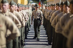 A Marine Corps Staff Sgt inspects a platoon. (U.S. Marine Corps Lance Cpl. Zachary Beatty)