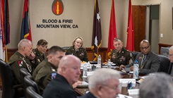 Military personnel at a strategy meeting in Silicon Valley