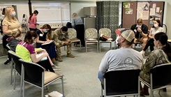 Meternity patients filling out forms 