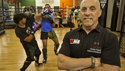 Nebraska Air National Guard Col. (Dr.) Mark Shirley takes in a practice at Mick Doyle’s Kickboxing and Fitness Center in Omaha, Nebraska, on Oct. 10, 2022. A member of the Nebraska Air National Guard where he serves as the state surgeon, Shirley is also a doctor of osteopathic medicine and a member of the emergency department staff of the Memorial Community Hospital and Health System in Blair, Nebraska. (Photo: U.S. Air Force National Guard Lt. Col. Kevin Hynes) 