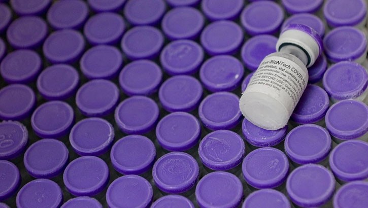 Containers of the Pfizer COVID-19 vaccine. Each vial contains six doses for vaccination against the COVID-19 virus.