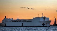 Military Sealift Command hospital ship USNS Comfort steams into New York City Sept. 14, 2001, in the wake of the 9/11 attacks. (U.S. Navy photo by Petty Officer 1st Class Preston Keres)