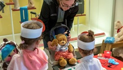 Walter Reed National Military Medical Center pediatric residents and Uniformed Services University of Health Sciences medical students teach children about vitals and immunizations during the Sept. 23, 2023, Teddy Bear Clinic at the National Museum of Health and Medicine in Silver Spring, Maryland. (NMHM photo by Ian Herbst)