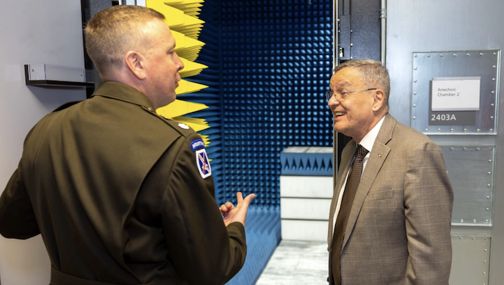 Army Lt. Col. Scott Vial, Defense Centers for Public Health-Aberdeen Public Health Laboratory project manager, briefs Dr. Lester Martinez-Lopez, Assistant Secretary of Defense for Health Affairs, outside of one of two anechoic chambers used for radio frequency experiments in the Public Health Laboratory at Aberdeen Proving Ground South. (Defense Centers for Public Health-Aberdeen photo by Graham Snodgrass)