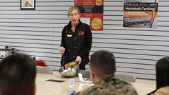 A woman leads a presentation.