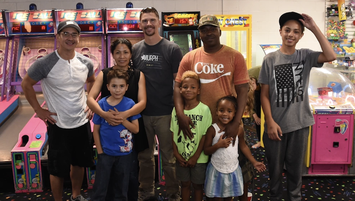 Schriever Air Force Base Airmen and their families gather for a deployed family event at Skate City in Colorado Springs, Colorado, Sunday, Aug. 27, 2017. Families enjoyed free pizza, roller-skating and arcade games during the event, which was designed to bring the families of deployed Airmen together. (U.S. Air Force photo: Staff Sgt. Wes Wright)