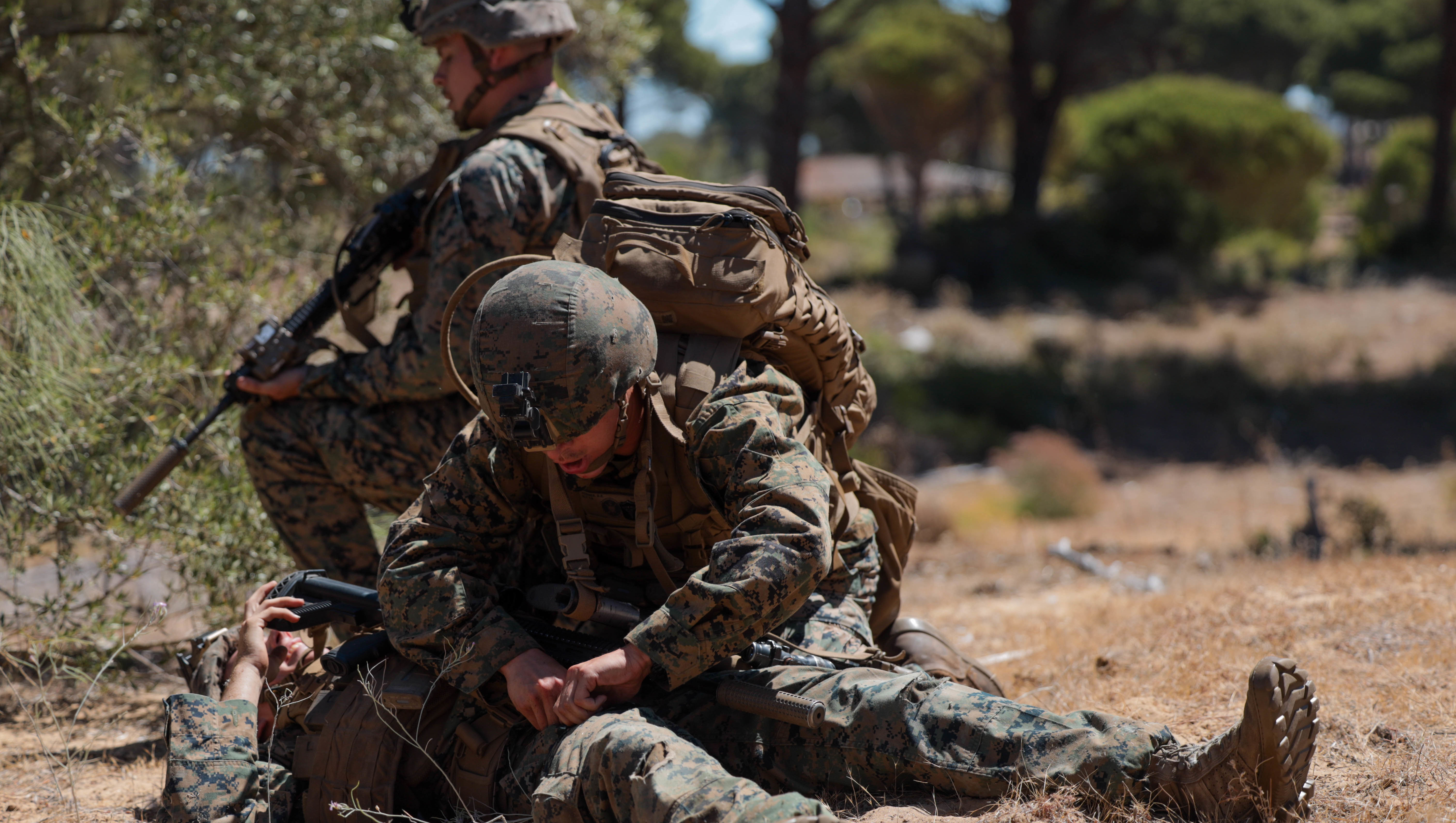 Link to Photo: U.S. Navy Hospital Corpsman Dante Horner, a corpsman with 1st Battalion, 8th Marine Regiment, 2d Marine Division, performs tactical combat casualty care during Spanish FLOTEX-22 near Rota, Spain, June 9, 2022. This exercise features tactical level actions ashore, combined with joint training and planning, aimed at increasing overall bilateral interoperability between nations. (U.S. Marine Corps photo by Lance Cpl. Megan Ozaki)