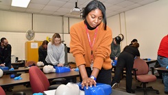 Military medical personnel practicing CPR