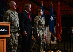 Nebraska Governor Jim Pillen and U.S. Army Maj. Gen. Daryl Bohac, Nebraska adjutant general, present the Nebraska National Guard Heroism Medal to U.S. Army Sgt. Brandi Sullivan during the Nebraska Adjutant General Change of Command Ceremony, on July 8, 2023, at the Pinnacle Bank Arena in Lincoln, Nebraska.  (Photo: U.S. Air National Guard Staff Sgt. Jamie Titus) 