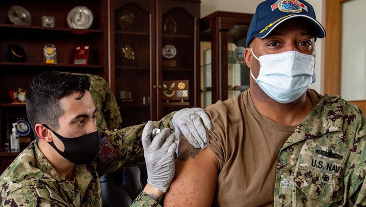 Image of Military personnel getting their flu shot.