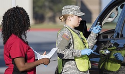 Medical staff at Eisenhower Army Medical Center, Fort Gordon, Georgia, immunized nearly 1,200 people recently with their drive-through flu vaccination event. (U.S. Army photo by John Corley)