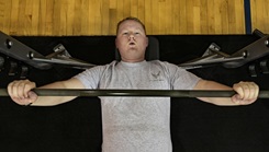 Military personnel working out at the gym