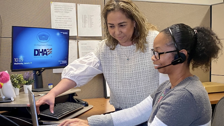 Maria Naranjo (L), NMCSD IRMAC specialist, offers IRMAC training to Danielle Hardy (R), NMCSD medical support assistant. (Photo: Marcelo Calero)
