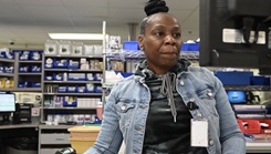 A pharmacy technician reviews medication requests getting filled through the dispensing system at Kimbrough Ambulatory Care Center's Main Pharmacy, Feb. 28, 2024. (Photo By Michelle Gonzalez)