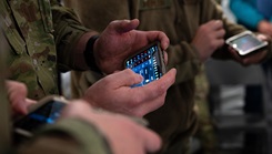 U.S. airmen assigned to the 354th and 673rd Medical Group use the Battlefield Assisted Trauma Distributed Observation Kit tool during a capabilities-based assessment at the Yukon Training Area near Eielson Air Force Base, Alaska, on Sept. 14, 2021. The mobile medical tool, developed by U.S. Air Force laboratory researchers, was selected as the joint integrated electronic health record for point-of-injury and en route care by Joint Operational Medicine Information Systems. (Photo: U.S. Air Force Airman 1st Class Jose Miguel T. Tamondong)