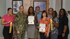 Members of the Health Promotion and Wellness team at Camp LeJeune pose for picture