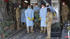 12 COVID-19 patients aboard a C-17 Globemaster III aircraft