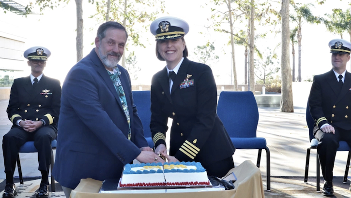 Navy Capt. Jenny Burkett, director of Naval Hospital Camp Pendleton, and retired Master Chief Petty Officer Kevin Burg, former Command Master Chief of Naval Hospital Camp Pendleton, cut a ceremonial cake on Jan. 30, 2024, in celebration of the 10-Year Anniversary of the grand opening of the current hospital held aboard Marine Corps Base Camp Pendleton.  (Photo: Petty Officer 2nd Class Caitriona Estrada)