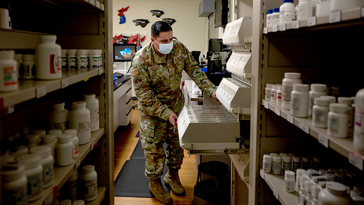 Military medical personnel in pharmacy