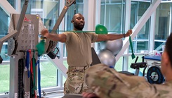 Staff Sgt. Jeffrey Trigg, 4th Component Maintenance Squadron egress technician, exercises his injury under supervision from Kendall Erickson, a 4th Operational Medical Readiness Squadron physical therapy clinic physical therapist assistant contractor at Seymour Johnson Air Force Base, North Carolina, June 22, 2023. The physical therapy clinic’s vision is to maintain professional airmen ready to fight, and one of the wing commander’s priorities is to improve combat readiness. (U.S. Air Force photo: Airman 1st Class Leighton Lucero