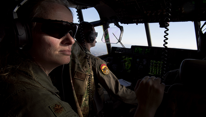 U.S. Air Force Maj. Sandra Salzman, 37th Airlift Squadron pilot and physician, sits in the cockpit of a C-130J Super Hercules aircraft over Zaragoza, Spain, on Jan. 27. The training exercise included three C-130Js aircraft assigned to the 37th Air Squadron. (Photo by U.S. Air Force Airman 1st Class Madelyn Keech)