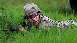 Military personnel in driver and casualty evacuation training