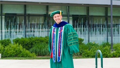 U.S. Navy Lt. Cmdr. Christian Betancourt received his doctorate in health services research from George Mason University in three years and graduated with honors. Earlier this year, Betancourt came to work at Uniformed Services University as an assistant professor for the Master of Health Administration program before taking the reins as program director earlier this year. (Courtesy Photo)