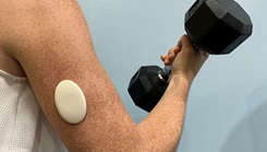 Military personnel demonstrating a wearable human performance monitoring device