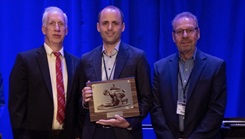 Ian Stanley, with the department of emergency medicine at Anschutz Center for Combat Medicine and Battlefield, University of Colorado School of Medicine, receives first place in the 2023 Military Health System Research Symposium Young Investigator Competition for his presentation titled, “Lethal Means Safety Counseling Among Firearm-Owning U.S. National Guard Personnel: Hyperarousal Symptoms as a Moderator of Treatment Outcomes” at the 2023 MHSRS in Kissimmee, Florida, Aug. 17. (Photo: Robbie Hammer)