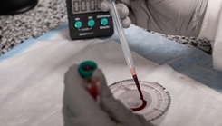 U.S. Air Force Senior Airman Taylor Ford, a chemistry section laboratory technician assigned to the 39th Medical Operations Squadron, pipettes blood onto a testing cassette at Incirlik Air Base, Turkey, on July 26, 2023. Chemistry results give vital information about how well the liver, kidneys, and other organs are functioning. (Photo by U.S. Air Force Senior Airman Alexis Sandoval)