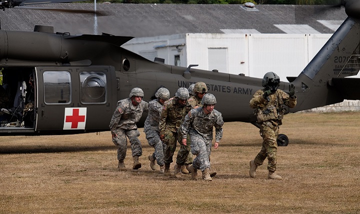 Link to Photo: It is important for Soldiers to know what to expect when a MEDEVAC helicopter arrives and how to approach the helicopters, load patients aboard and how to interact with their crew chief and flight medic in order to do ground handoffs. (U.S. Army photo by Sgt. 1st Class Matthew Chlosta)