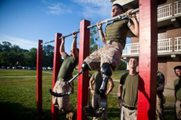 Link to Photo: Lance Cpl. Adrian Simone, an infantryman with 1st Battalion, 6th Marine Regiment, from Montville, N.J., does pull-ups at Camp Lejeune, N.C., May, 08, 2012. Simone lost both of his legs to an improvised explosive device in August, 2011 in Helmand province, Afghanistan. DoD photo by Cpl. Jeff Drew