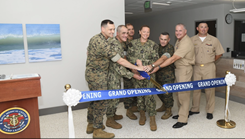 Military personnel at ribbon cutting ceremony