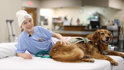 Ryan Mackey, a patient at Walter Reed National Military Medical Center, speaks on the impacts of facility dogs at Walter Reed in the Military Advanced Training Center at Walter Reed in Bethesda, Maryland, June 28, 2023. Walter Reed's facility dogs initially undergo traditional service dog training with an accredited outside organization, and at Walter Reed they go through an additional training to become "facility dogs" to work in a clinical setting. (DOD video by Ricardo J. Reyes and Mass Communication Specialist 2nd Class Brett Walker)