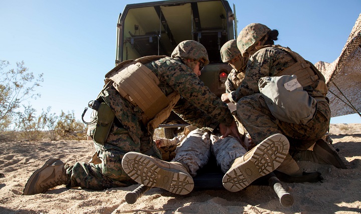 Link to Video: Hospital corpsmen and Marines check a simulated casualty and remove their body armor during Exercise Steel Nightâs mass casualty drill at Marine Corps Air Ground Combat Center Twentynine Palms, Calif., Dec. 12, 2015. The drill tested the 1st Marine Divisionâs ability to react to a large influx of injuries and wounds from battling the enemy. Steel Knight provides tough, realistic training for the Marines and sailors of 1st Marine Division.
